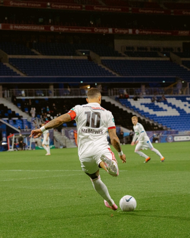  Memphis Depay (#10 Lyon) crosses the ball during the French Cup Quarter final game between 
Lyon and Monaco at Groupama stadium in Lyon, France.